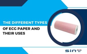 Various types of ECG paper displaying grids and thermal markings